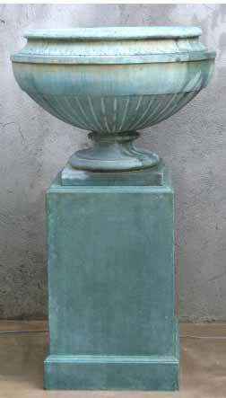 cast stone urn on pedestal