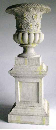 cast stone urn on pedestal